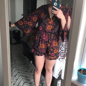 Floral green pink and orange romper